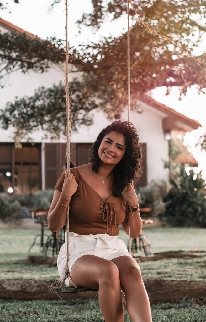 woman, swing, outdoors, garden, sunset, curls, nature, brunette